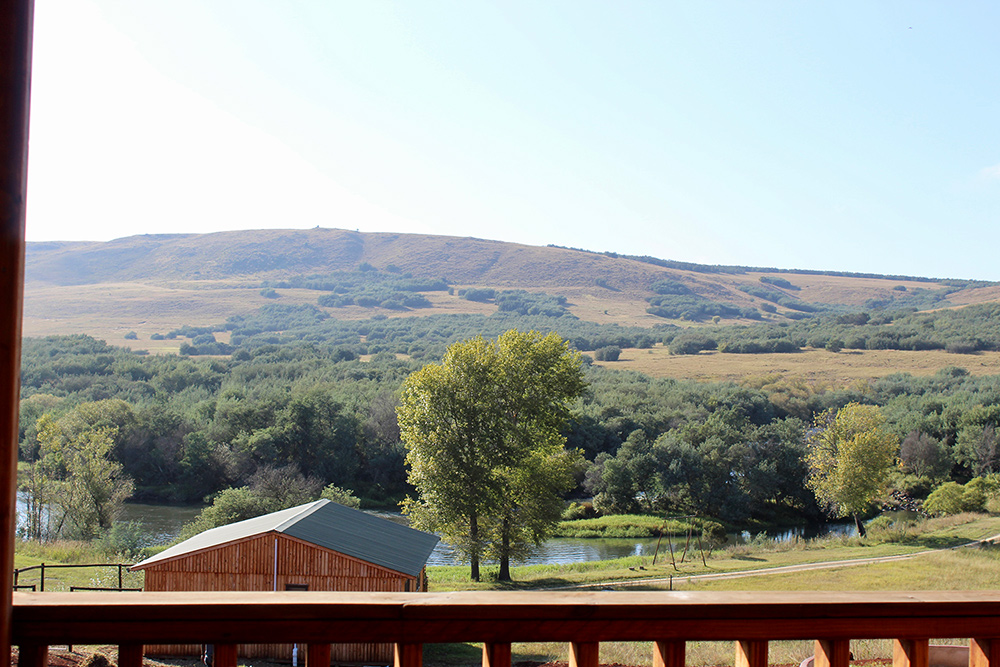 1-Bedroom Riverside Cabin 3: Ahava - View over the dam from the deck