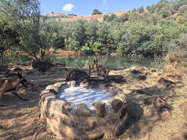 Camp 8 • Breath of Heaven - Stone fire pit above the river