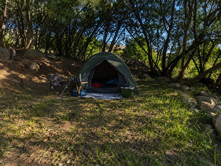 Camp 2 • Whispering Spirit - Tent pitched in dappled shade