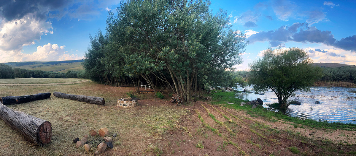 Camp 6 • Living Water - Riverside camp with fire pit and willows