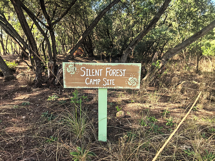 Camp 5 • Silent Forest - Silent Forest campsite sign